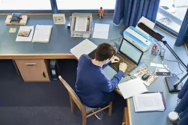 Student studying in Christ's College