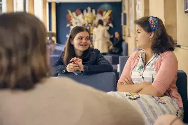Three female students talking